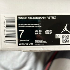 Air Jordan 11, Size 7 kids women 9 Animal Instinct
